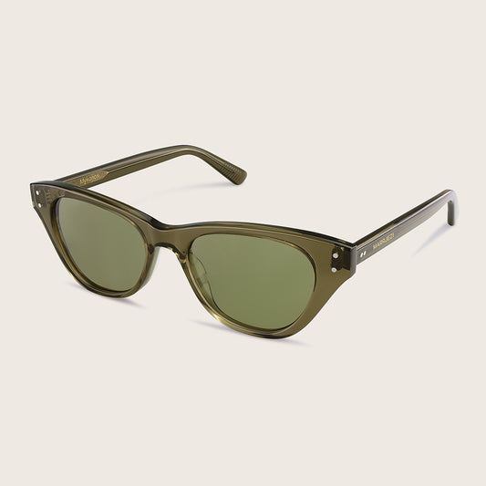 Green cat-eye sunglasses on a beige background