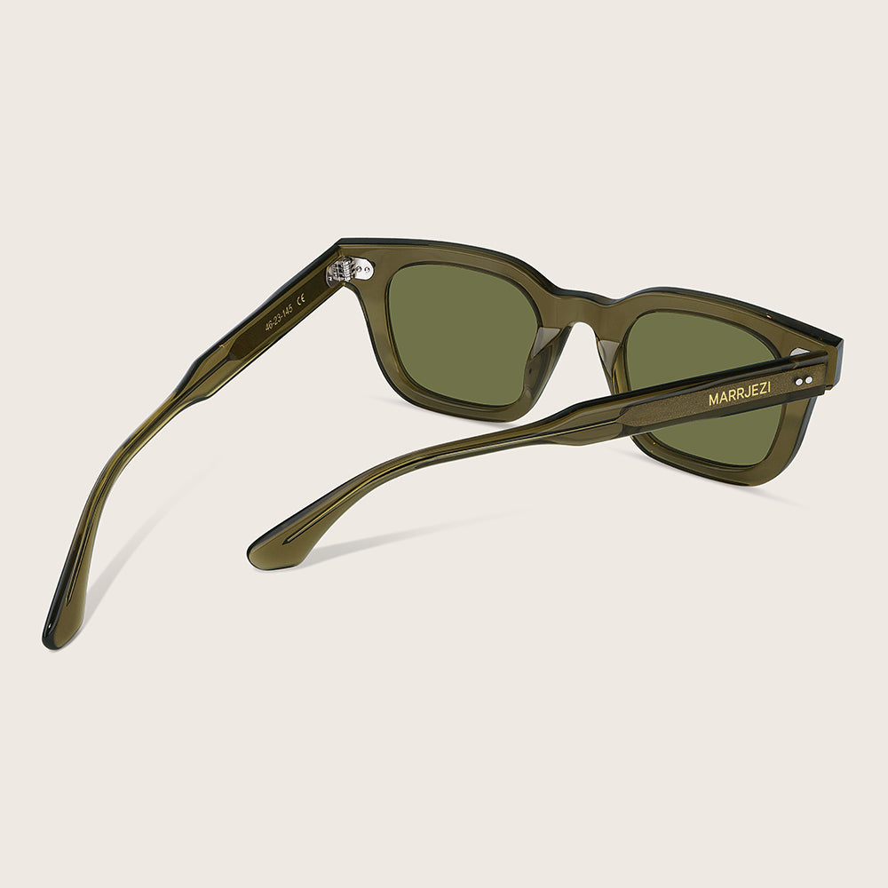 Green sunglasses with 'MARRIEZI' branding on a beige background