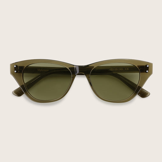 Green sunglasses with a beige background